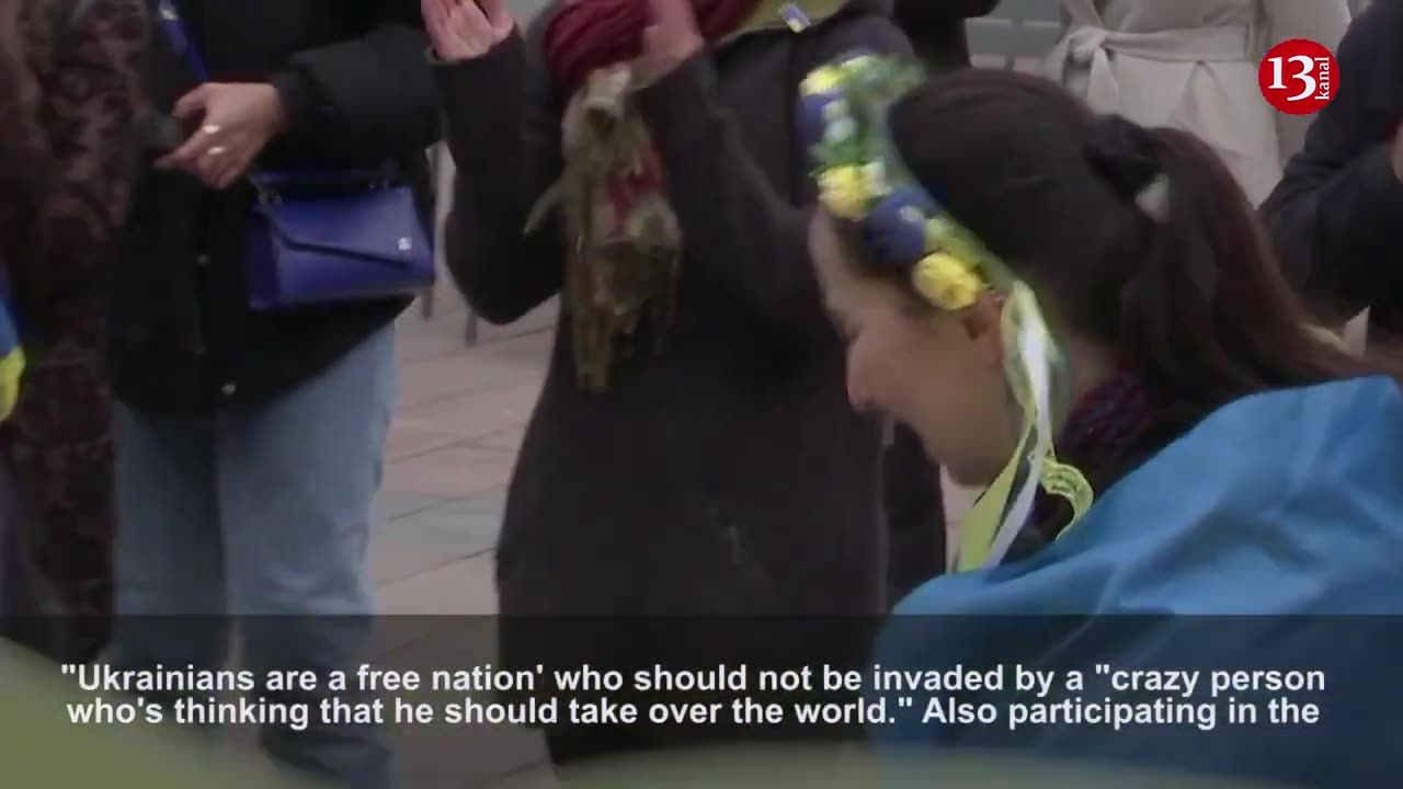 Giant Ukrainian flag unfurled at EU Parliament for invasion anniversary