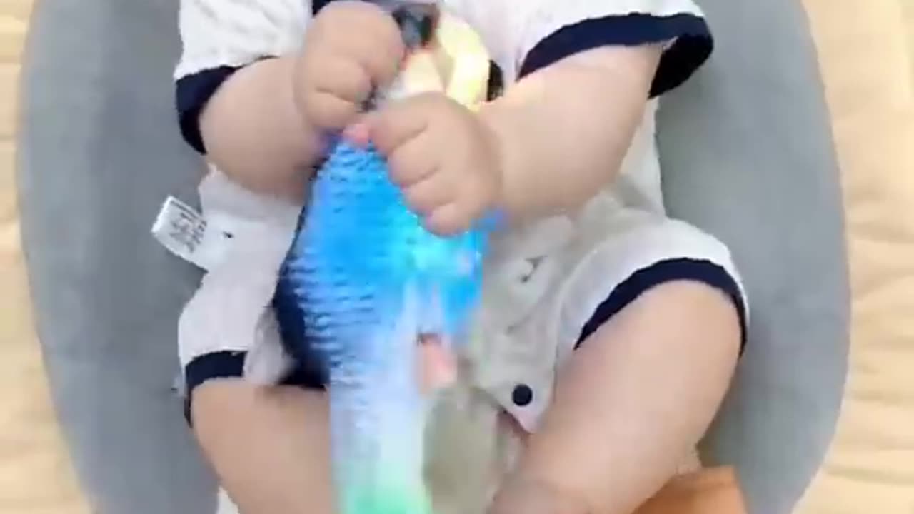 Cute baby with fish