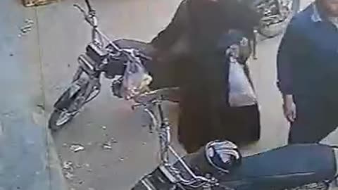 CCTV Photag||a woman stealing some thing