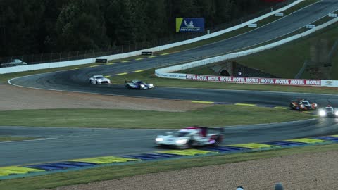 Race Cars in Turns on Circuit