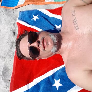 Tanning to be less White so not to look like a pasty Liberal