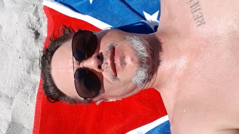 Tanning to be less White so not to look like a pasty Liberal