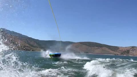 Water Ski Tube Flips Upside Down Crashing a Guy and Two Girls