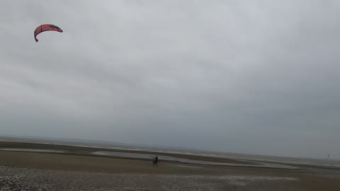 A kite surfer. Majestic.