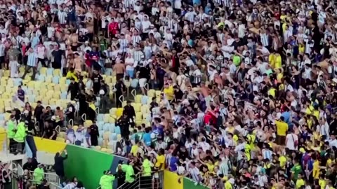 Argentina fans rushed by baton-armed Brazil police