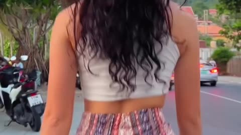 Girl walking in tight shorts
