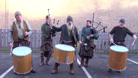 Scottish tribal pipes & drums band Clanadonia playing "Ya Bassa" during St Andrew's Day event 2019