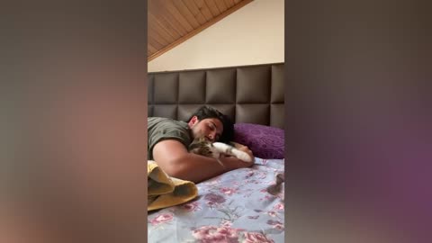 This dog sings along with his owner's guitar playing.