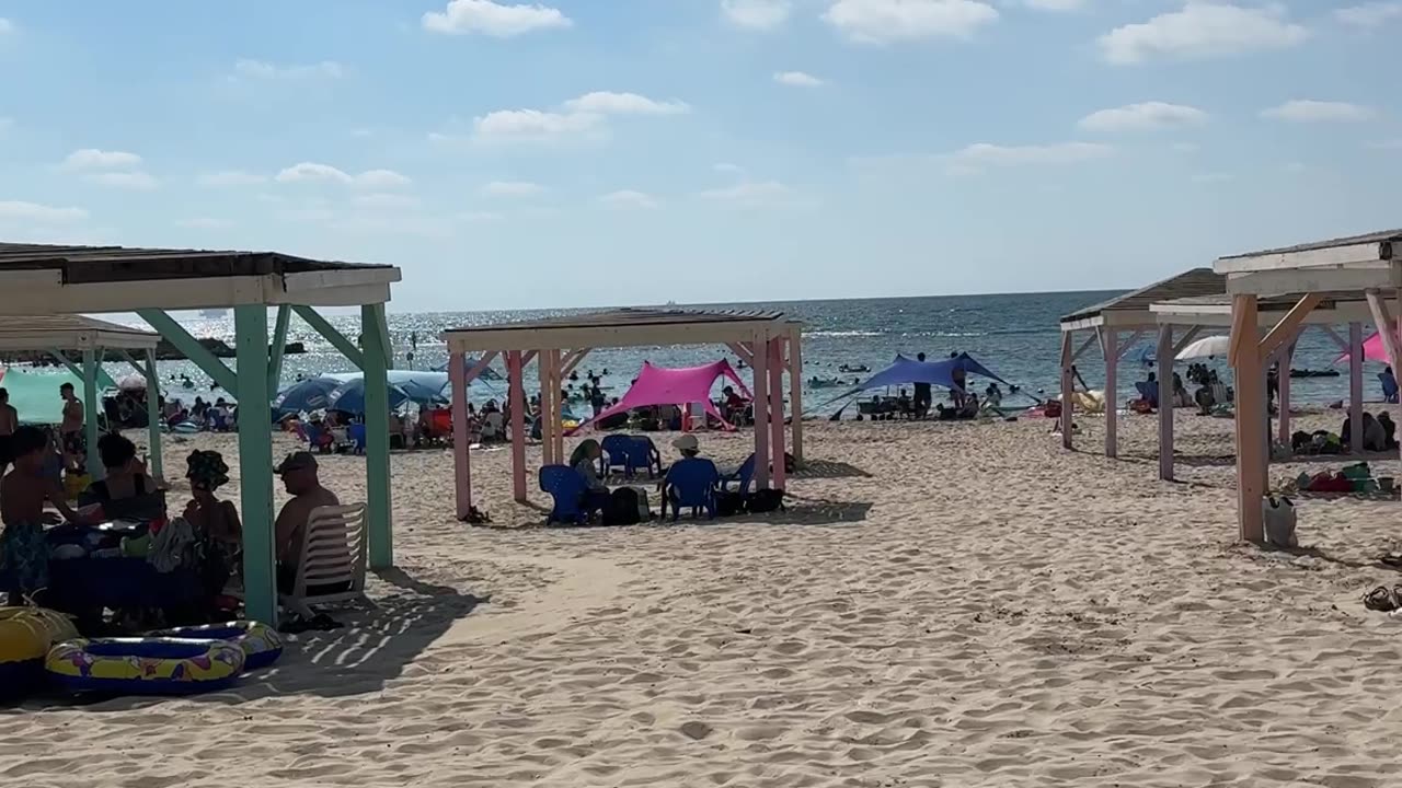 Israelis are enjoying a day at the beach near Haifa. 🇮🇱