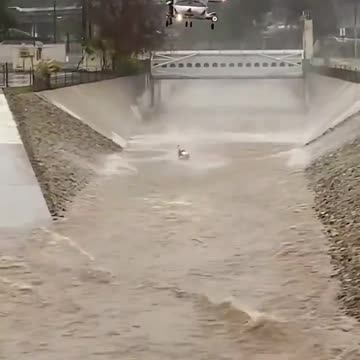 LA Fire Fighter Rescues Man from Treacherous Waters #dramatic #californiastorm