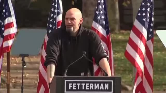 Watch as John Fetterman - flags are blown down behind him - God is trying to tell you something❗ 🤔