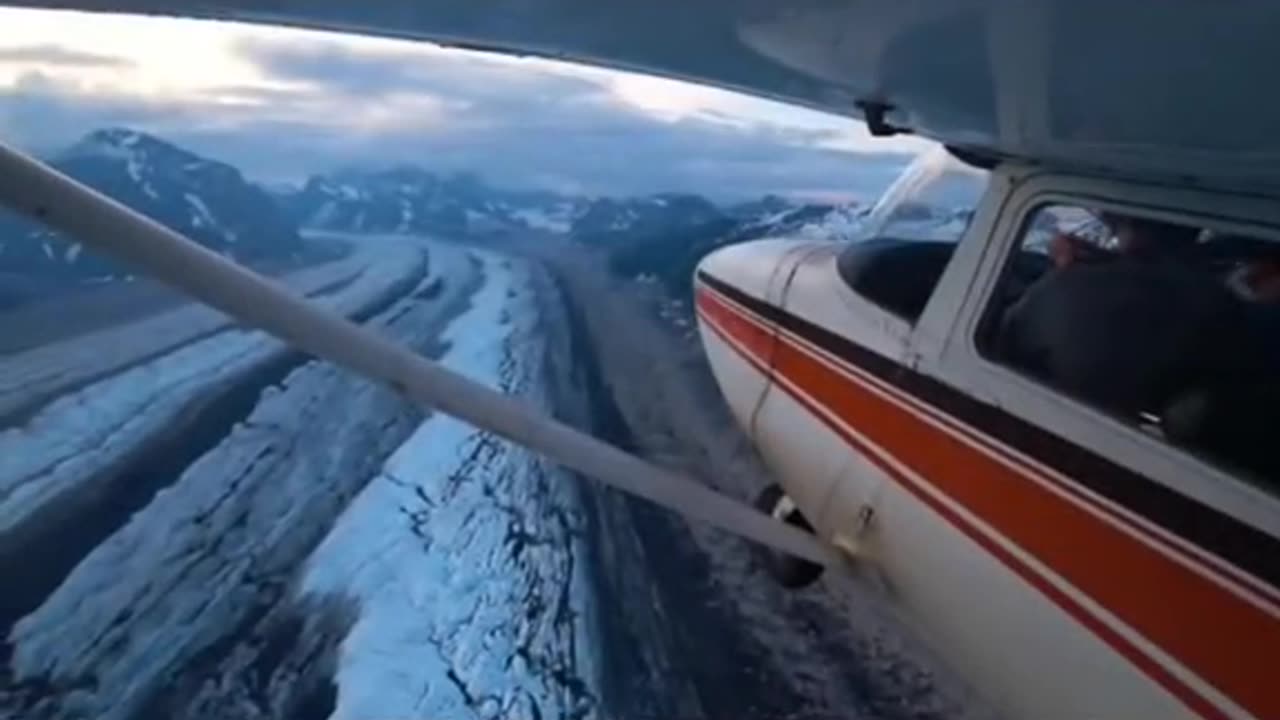 A pilot flies over the forbidden wall in Antarctica