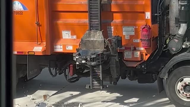 Garbage Truck Lift Arm Smashes Toilet