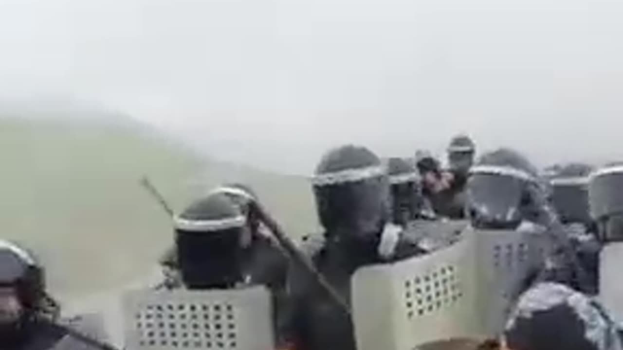 Azerbaijani grandmas vs riot cops in some field