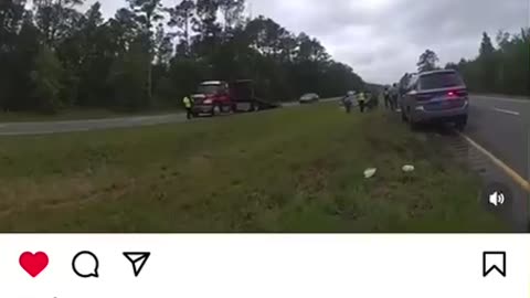 Lady hits parked tow truck on highway