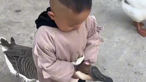 Kid and 🦆 duck