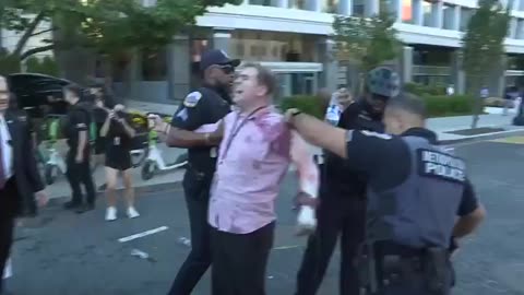 A man identifying as a CBS journalist set himself on fire during a protest in Washington, DC