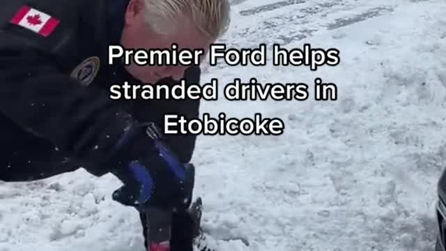 Ontario Premier Doug Ford helps stranded drivers in Etobicoke.