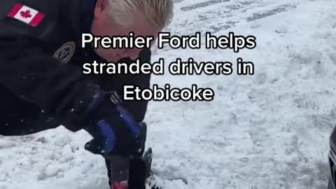 Ontario Premier Doug Ford helps stranded drivers in Etobicoke.