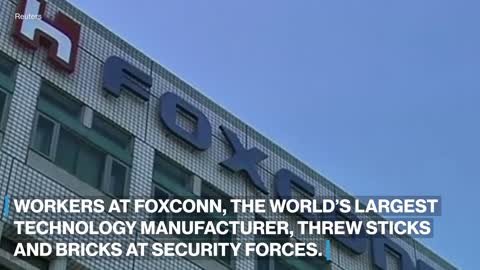 Workers clash with police at Foxconn factory in China