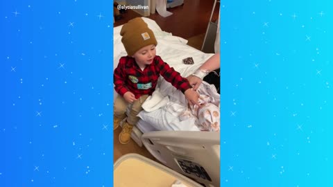 Toddler meets newborn little brother in adorable moment