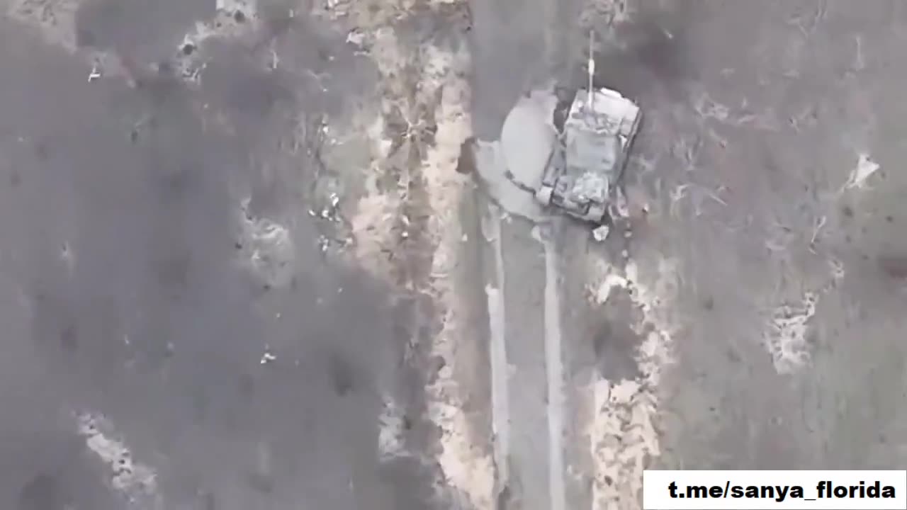 The commander of a Russian tank manually clears the way from Ukrainian mines.