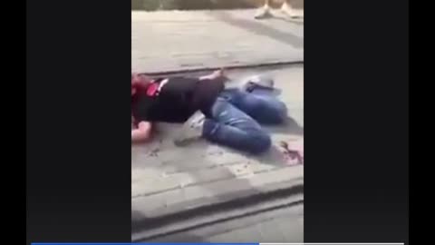 Israeli Jewish Zionists mock a child as he bleeds out on the ground. West Bank.