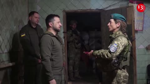 Ukraine's Zelenskiy visits front line to congratulate marine