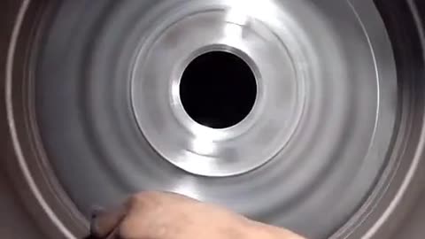 Grind a hub for rust removal.