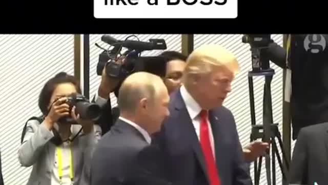 Putin jumps up to greet Trump