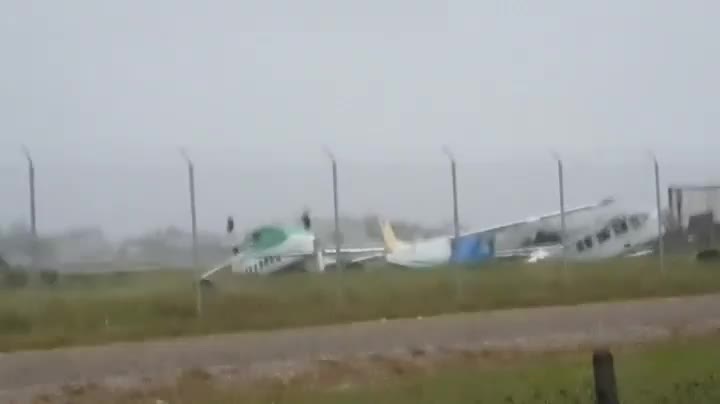 Hurrican Lisa's winds flip airplanes at airport