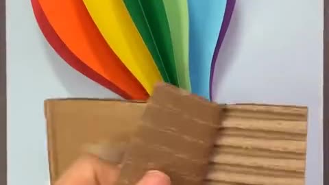 Colored cardboard and carton shell can be used to make a rainbow hot-air balloon