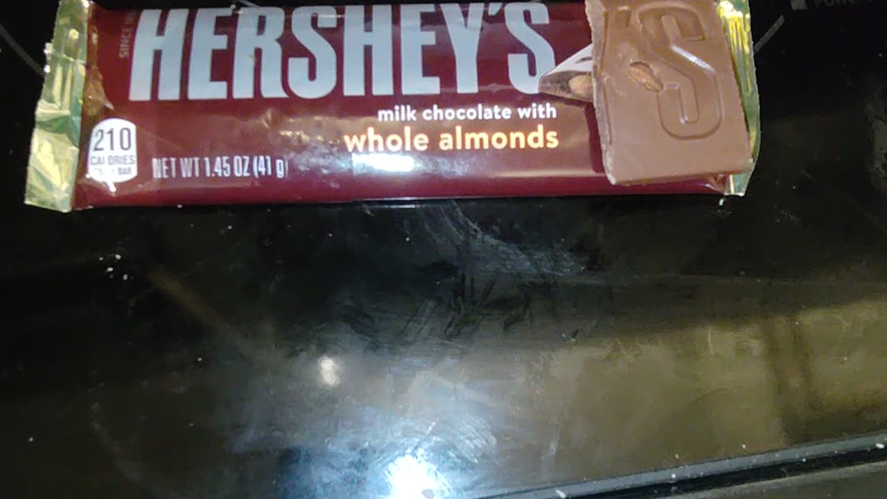 Eating Hershey's Milk Chocolate With Almonds, Dbn, MI, 3/17/24