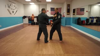 Correcting common errors executing the American Kenpo technique Delayed Sword