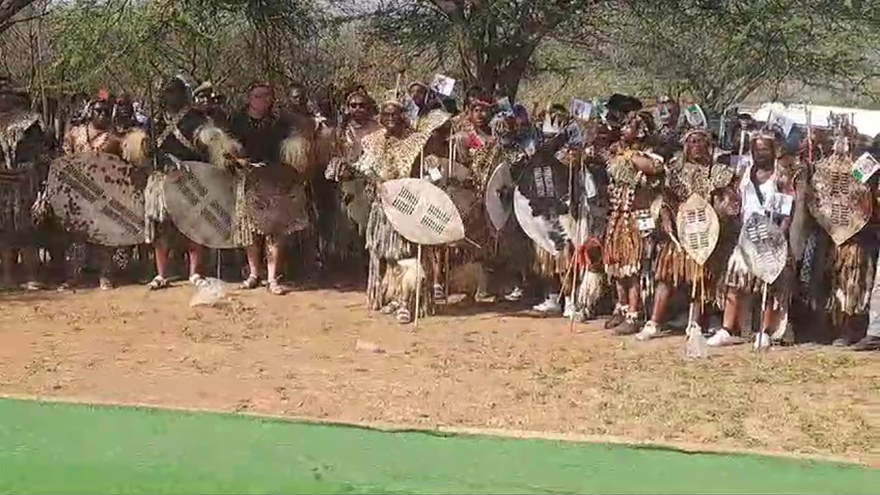 Amabuthu waiting outside Icebolethu mortuary to accompany remains of Buthelezi