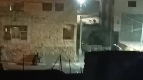 Palestinian with bulldozer classes with IDF in Hebron