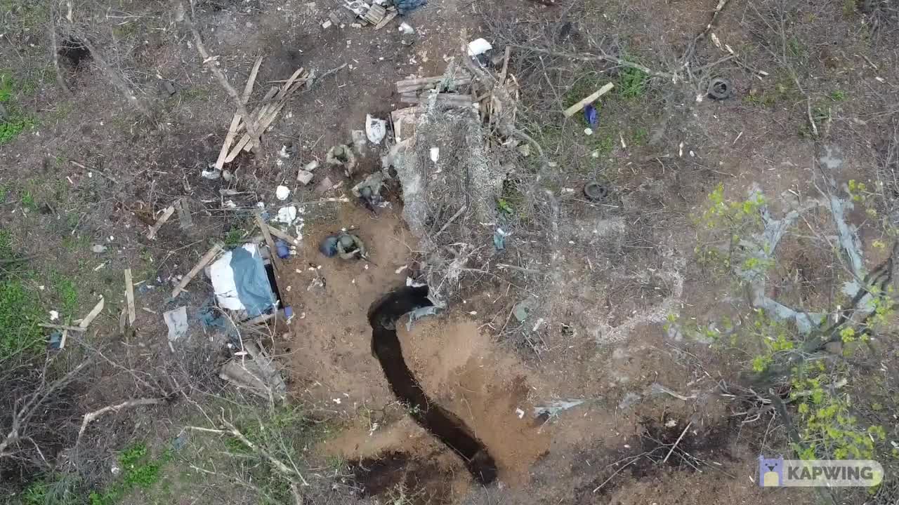 The drone records how the assault group of the DPR Armed Forces clears the Ukrainian dugout