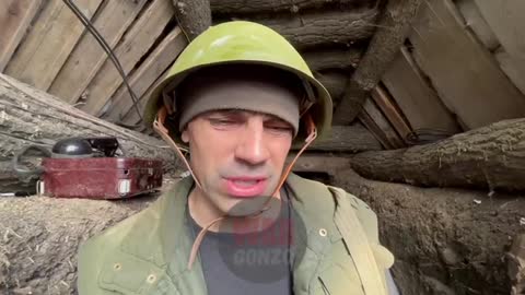 DPR soldiers inspect the occupied trenches of the Armed Forces of Ukraine