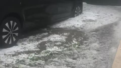 Streets Get Flooded With Rainwater and Hail After Sudden Hailstorm