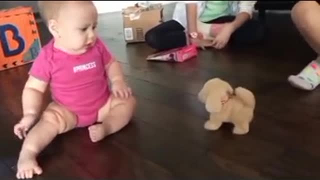 What a cute child please try to laugh