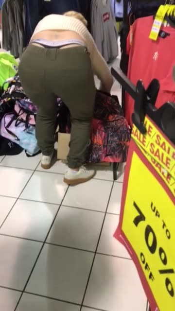 Store Worker Flashes Her Calvin Klein Thong