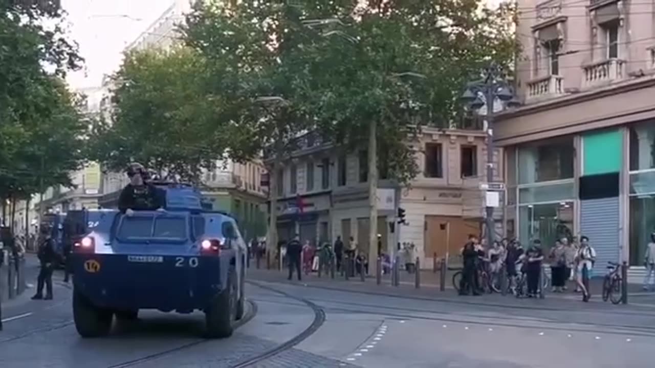 In Marseille Armoured vehicles of the Gendarmerie patrol the city centre.
