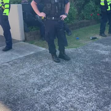 Queensland, Australia: 3 police detain man, put in stress position, put body weight on his back