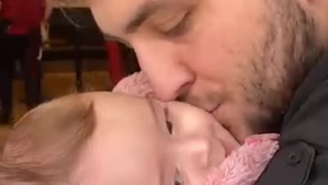 Cute baby and dad