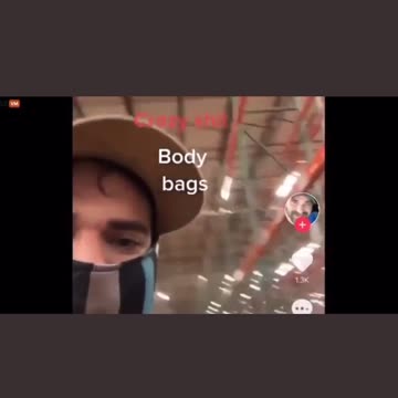Amazon employee showing body bags being loaded
