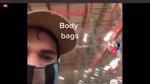 Amazon employee showing body bags being loaded