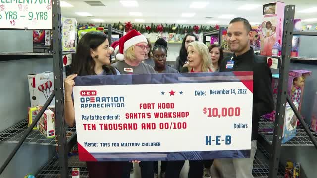 Fort Hood children get to choose toys at Santa's Workshop