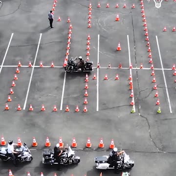 Riding a motorcycle in a cone maze!