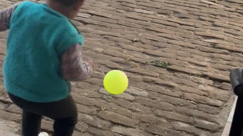 Baby playing in Nani house