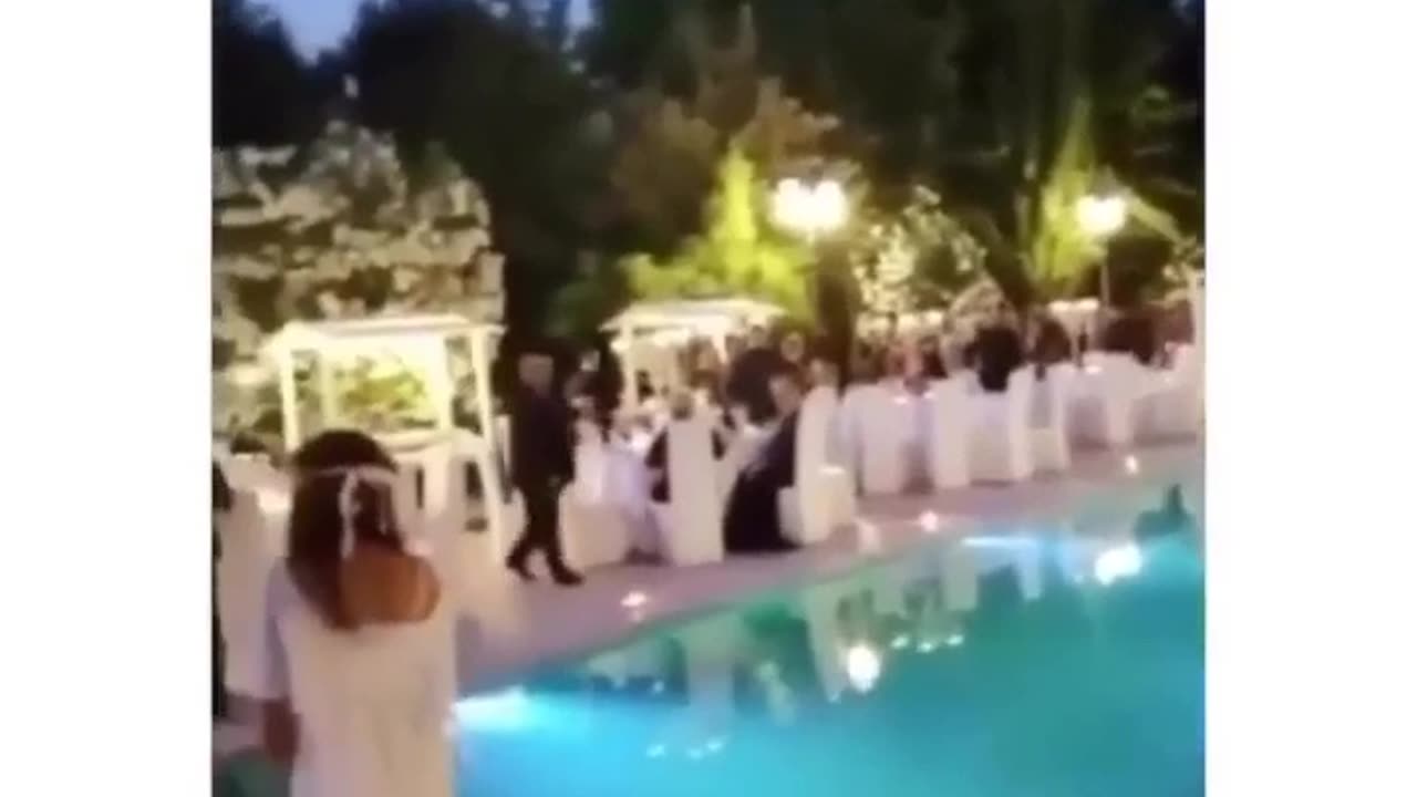 Who thought setting up tables this close to a pool in a weeding was a good idea?